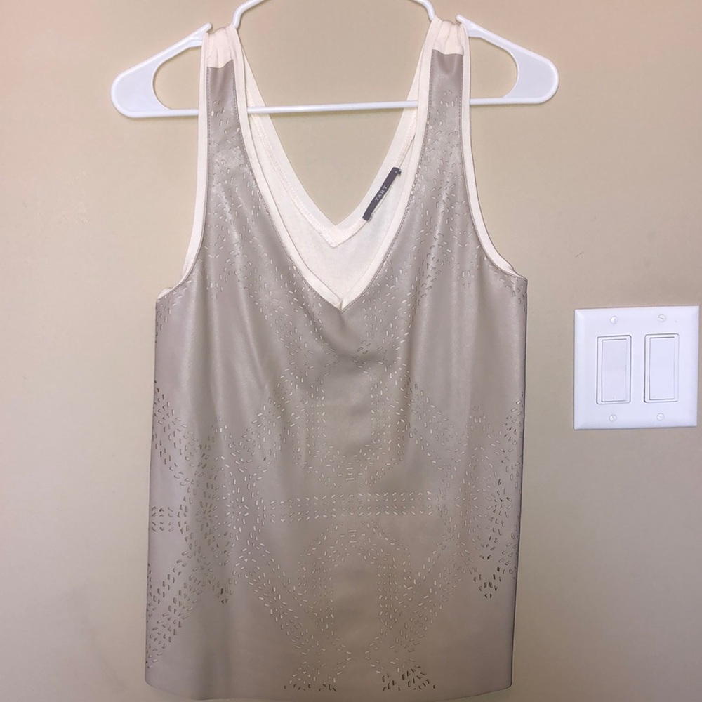 Tart grey leather shirt on front and cloth on bac